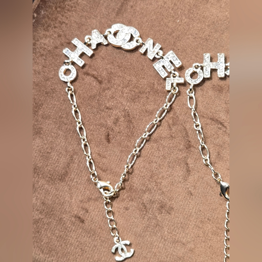 Gold Tone Logo Bracelet With Rocks - Picture 9 of 14